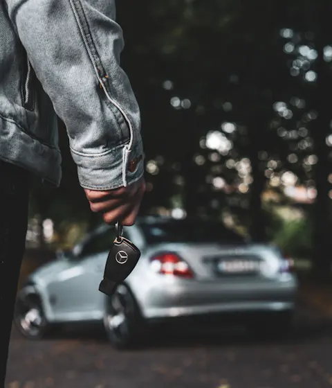 Holding new car keys
